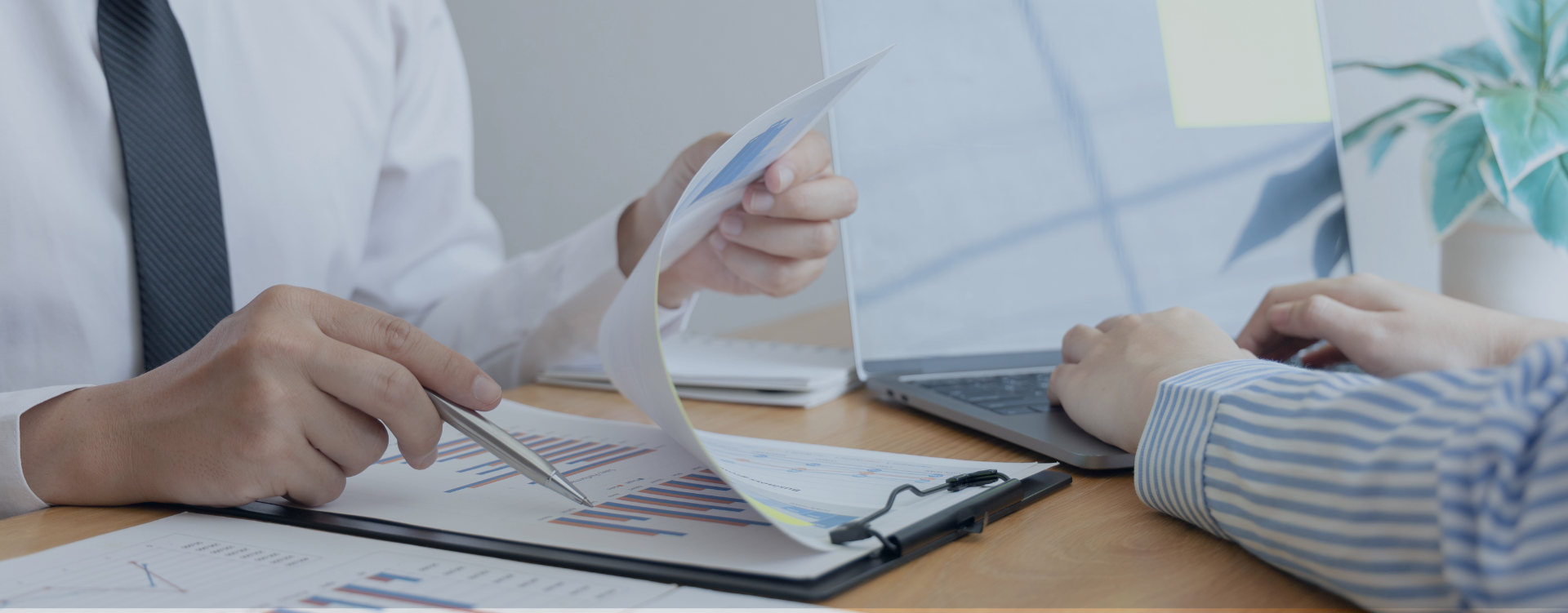 Headers man reviewing bar chart